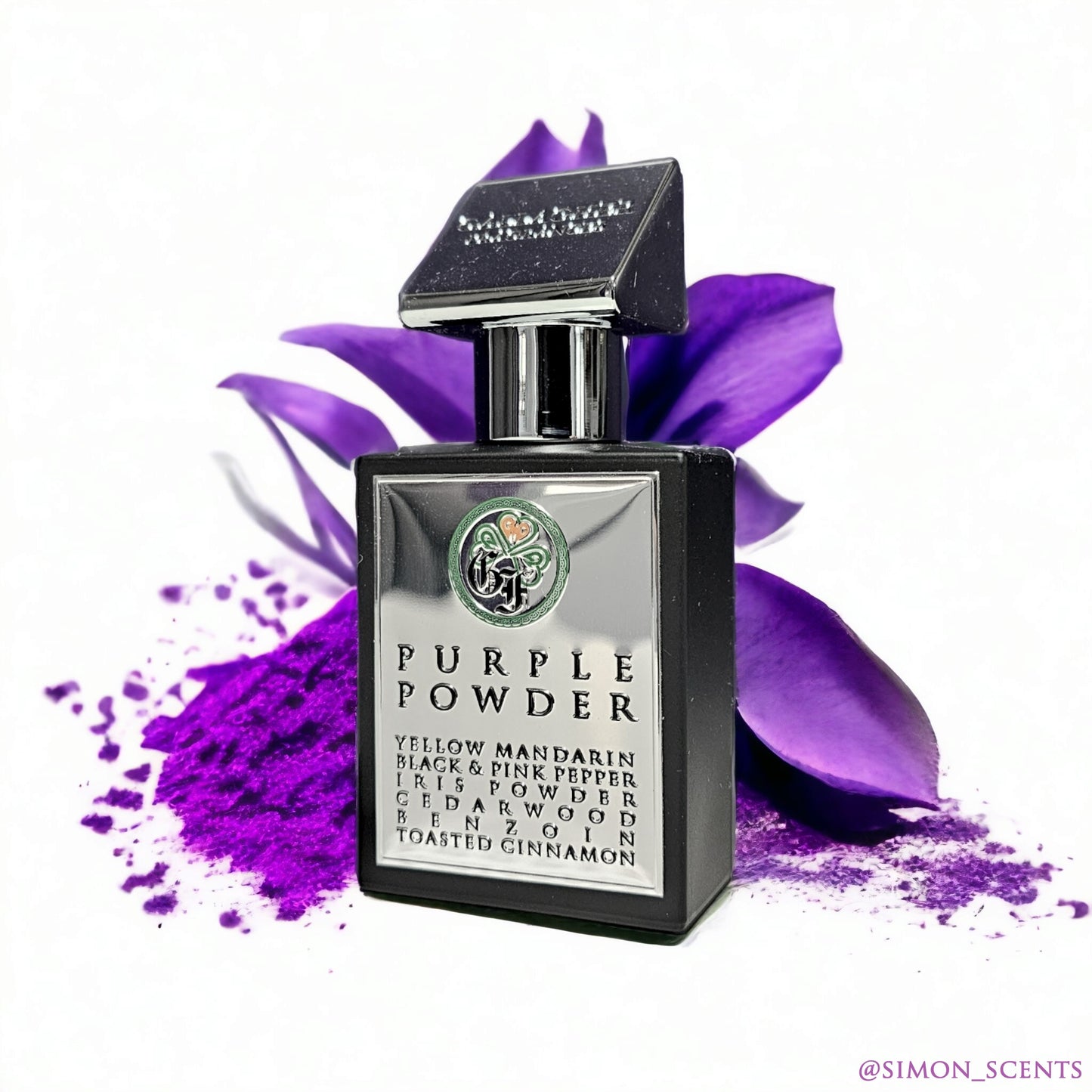 A bottle of 'Purple Powder' perfume with a label showing the fragrance name and notes such as Yellow Mandarin, Iris Powder, Cedarwood, Benzoin, Toasted Cinnamon, Patchouli, and Musk. The bottle is accompanied by a purple powder and a purple flower.